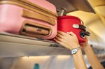 The great airline baggage shakedown: why your carry-on bag is now their most...