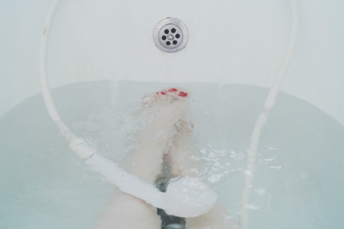 lady taking a warm bath