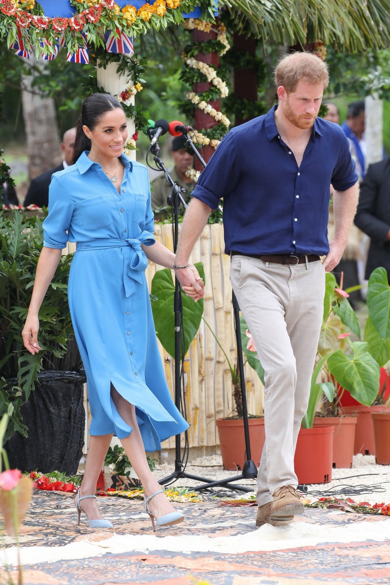 Meghan left in fit of giggles as Tongan students sing silly song for
