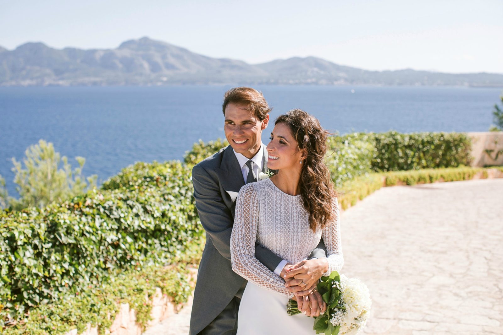 First photos: Rafael Nadal's bride is dazzling in classic lace wedding dress - Starts at 60