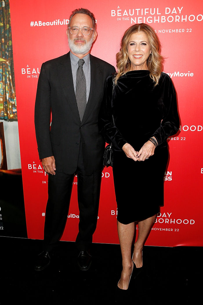 Rita Wilson is stunning in black silk and stilettos alongside husband ...