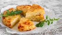 This potato tortilla can be jazzed up using vegetables and meats. It's so versatile! Source: Getty Images