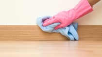 Cleaning the skirting boards. Source: getty
