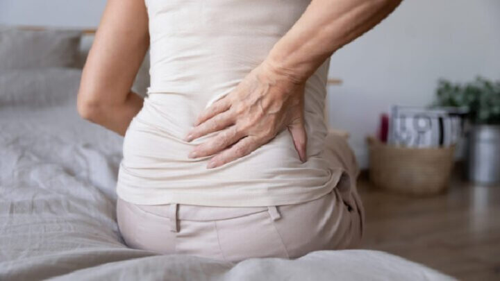 Back pain can really put a dampener on your day but this 10-second stretch may offer the relief you need. Source: Getty Images. 